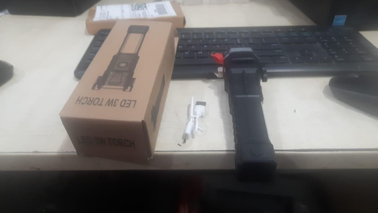 RelaxRemo Store portable rechargeable LED flashlight with USB charging cable and packaging box