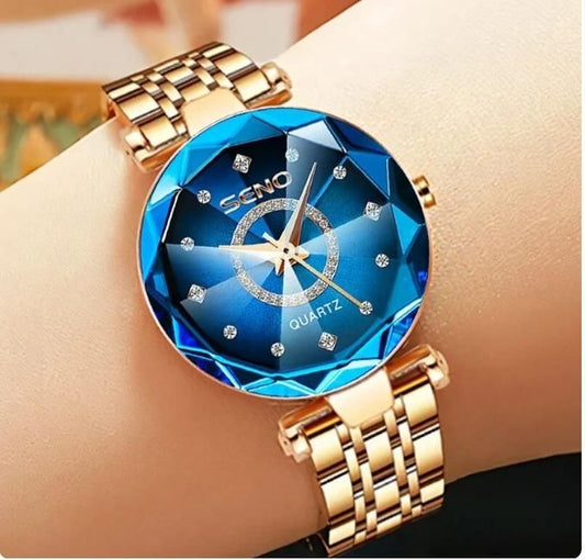 Diamond shaped ladies watch with blue faceted dial and gold metal bracelet from RelaxRemo Store